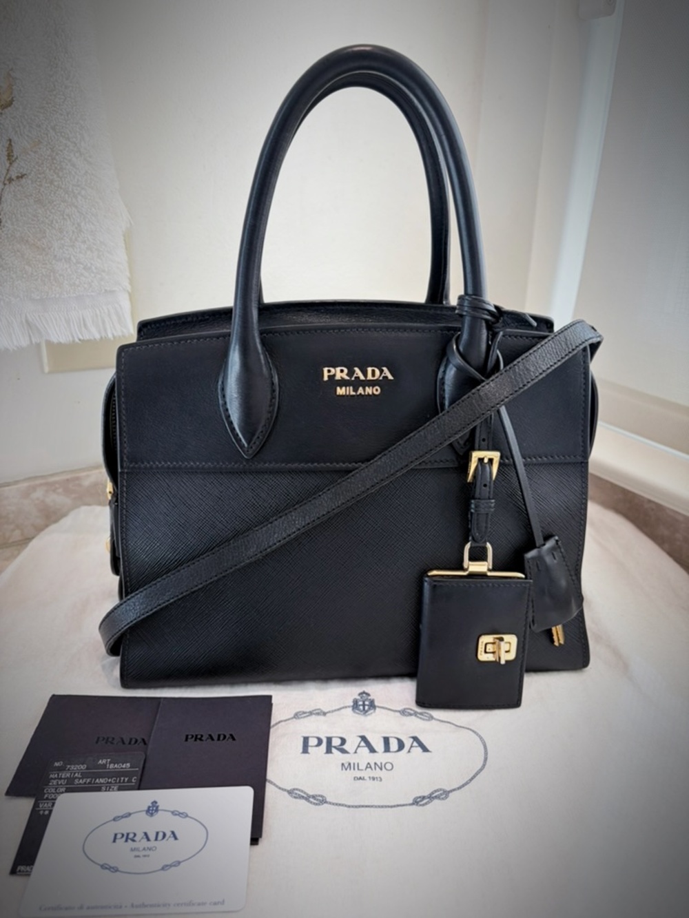Prada SMALL Black Saffiano Lux Leather Esplanade Bag with Original Strap & Card.
